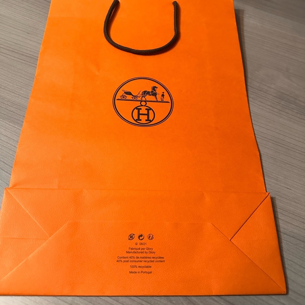 Hermes Orange Shopping Bag with Black Handles and Logo